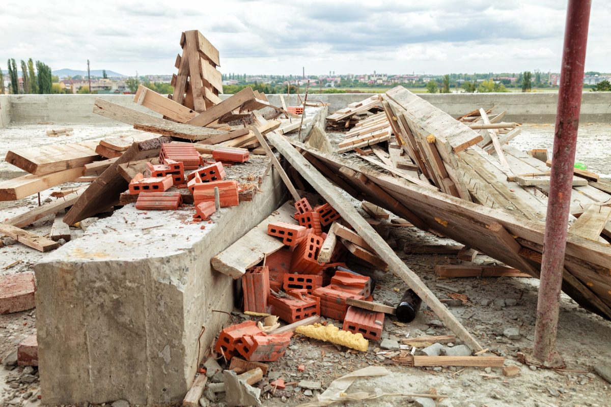 Construction waste on the roof of the house under construction. Outdoors